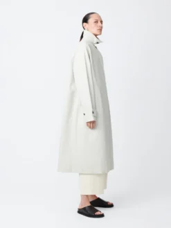 Studio Nicholson Holin Coated Cotton Coat In Dove