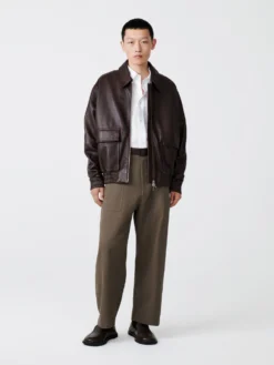 Studio Nicholson Piston Leather Jacket In Brown