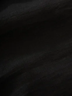 Studio Nicholson Knoll Dress In Black 13 Studio Nicholson Knoll Dress In Black -Studio Nicholson KNOLLSNW 517TRANSLUBBLACK 0309 scaled