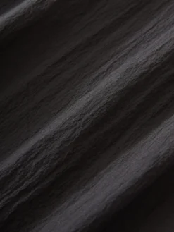 Studio Nicholson Opal Pant In Black 15 Studio Nicholson Opal Pant In Black -Studio Nicholson OPALSNM 1151WATERREPELLENTNYLNBLACK 666 scaled