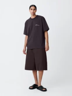 Studio Nicholson Reverse Denim Short In Black Grape