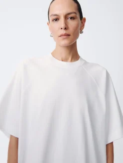 Studio Nicholson Stokes Dress In White 13 Studio Nicholson Stokes Dress In White -Studio Nicholson StokesSNW1502DryHeavyJerseyDressWhite5 scaled