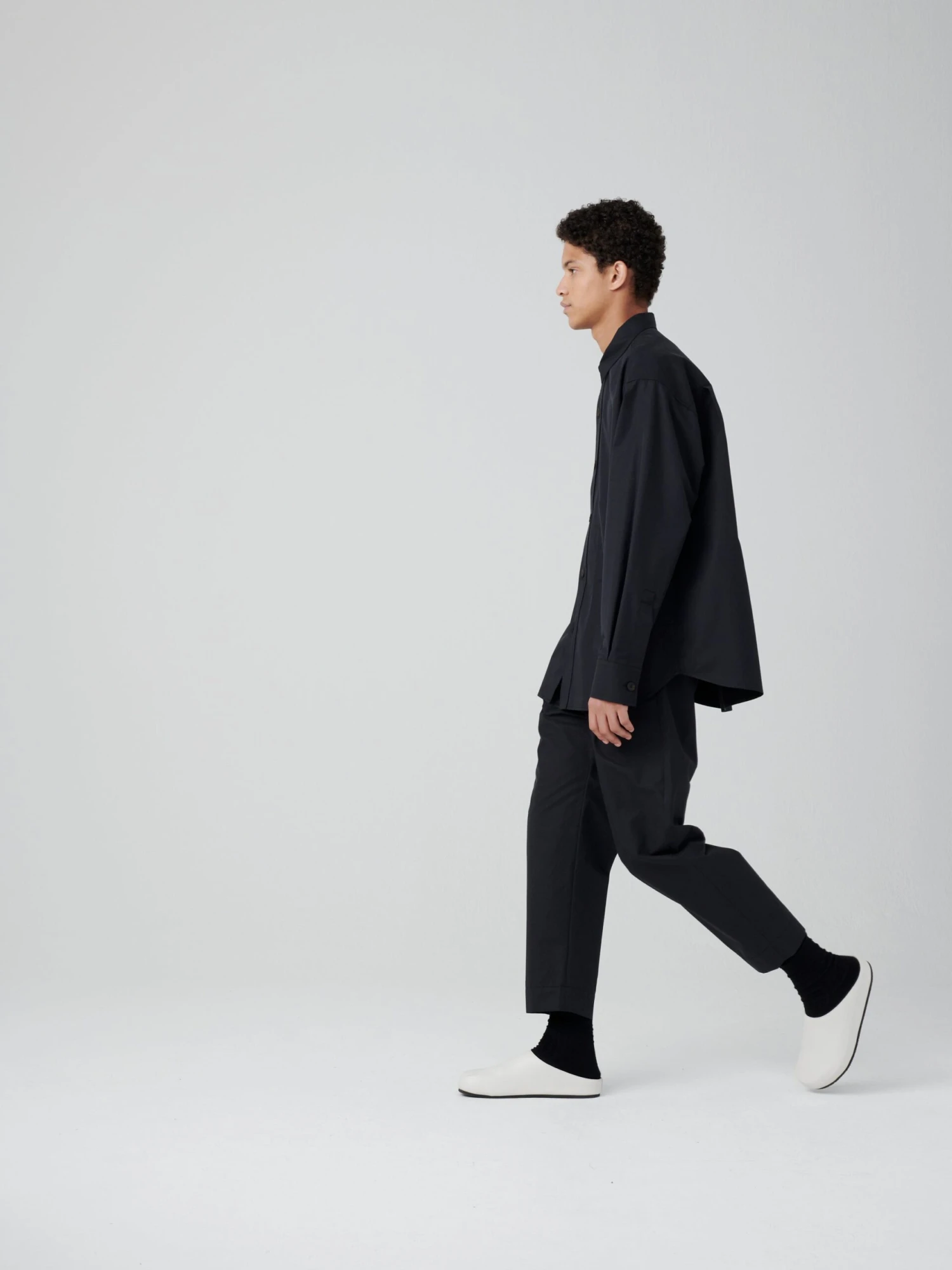 Studio Nicholson Men's Wearing Clog In Milk 6 Studio Nicholson Men's Wearing Clog In Milk - Image 6